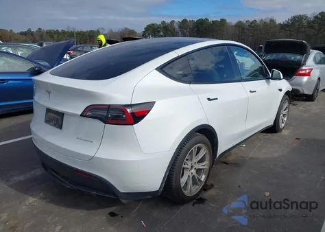 2023 Tesla Model Y Awd/Long Range Dual Motor All-Wheel Drive z USA, uszkodzony, nr VIN 7SAYGAEE4PF856425